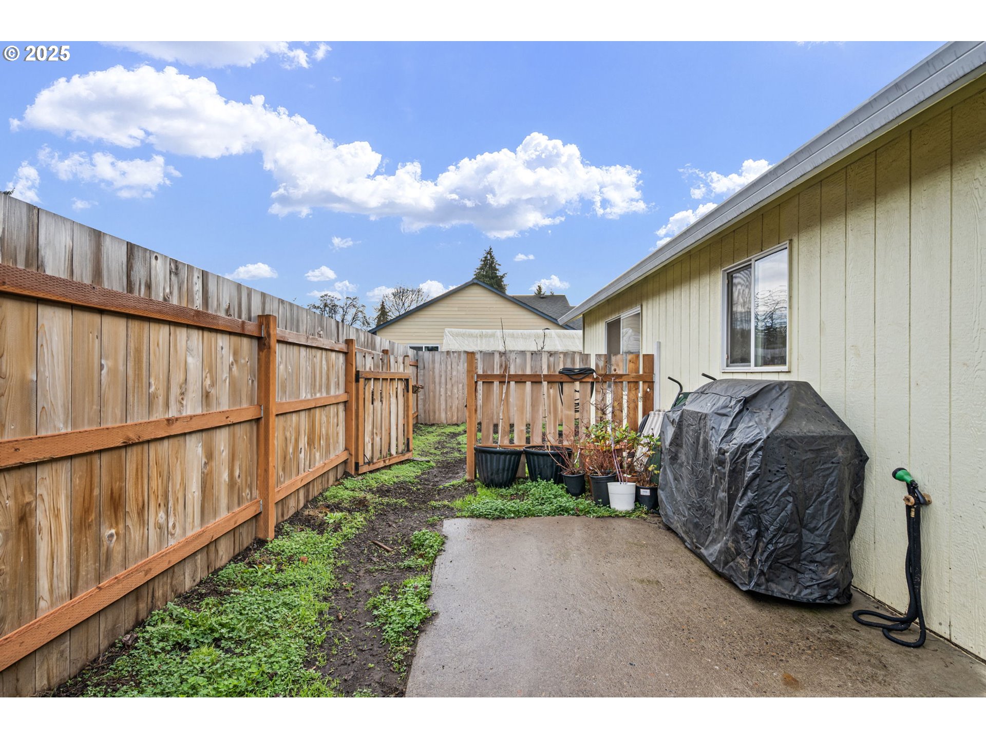 3785 Dove Lane Eugene, OR 97402 - Photo 40 of 43 a view of a house with wooden fence
