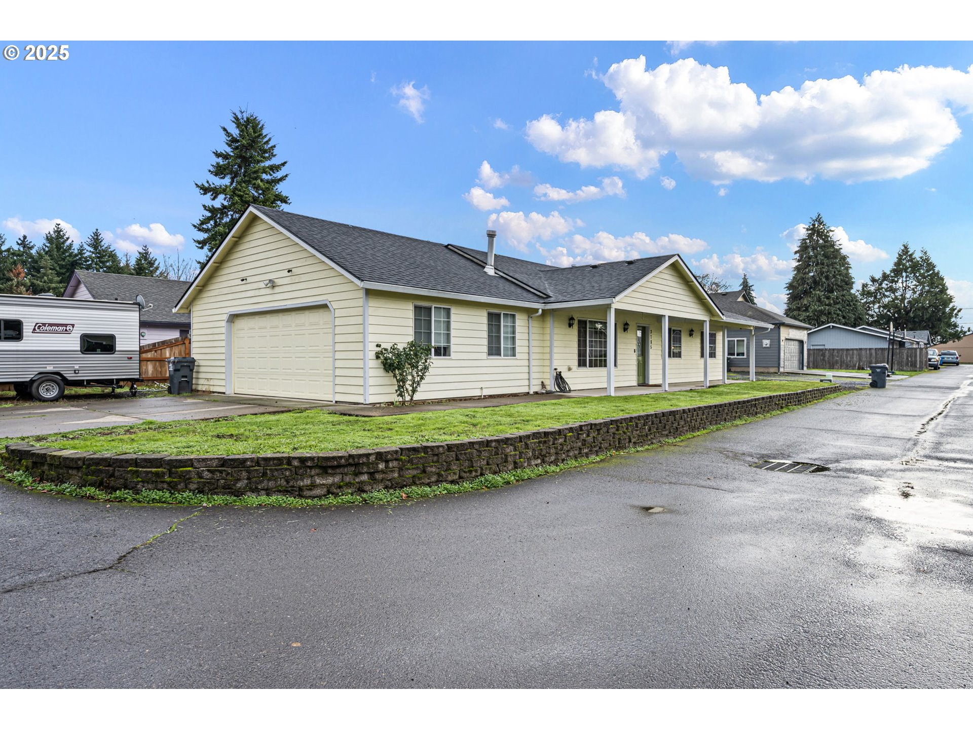 3785 Dove Lane Eugene, OR 97402 - Photo 43 of 43 a front view of a house with a garden