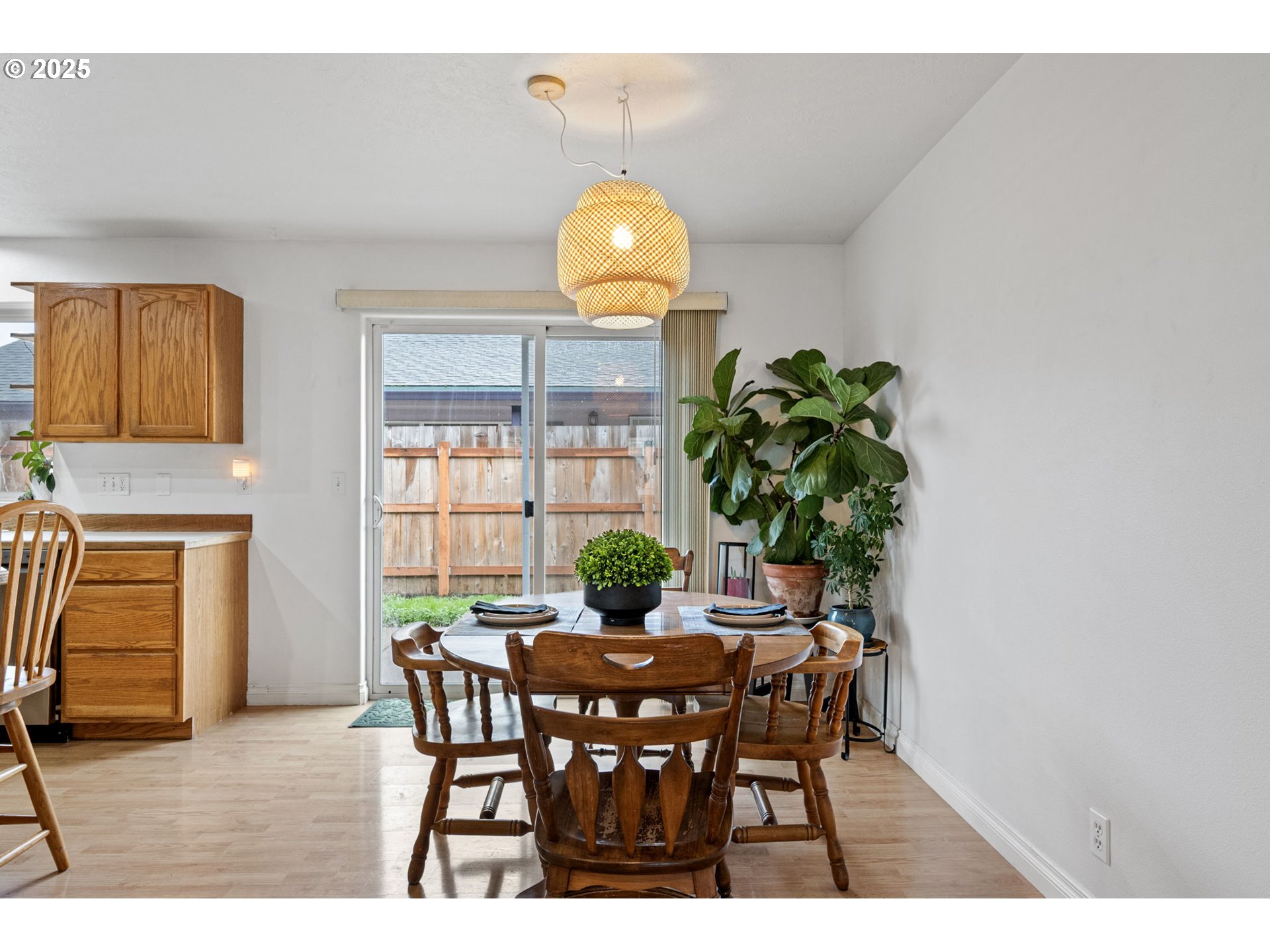 3785 Dove Lane Eugene, OR 97402 - Photo 10 of 43 a view of a dining room with furniture and chandelier