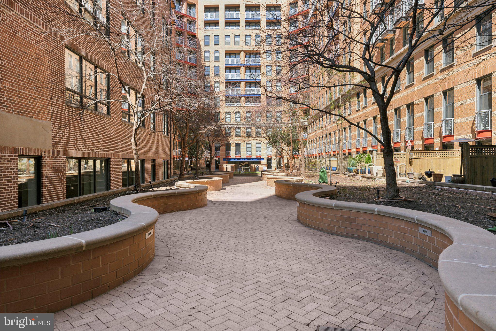 631 D Street Northwest, Unit 241 Washington, DC 20004 - Photo 12 of 81 a view of a building with cars parked