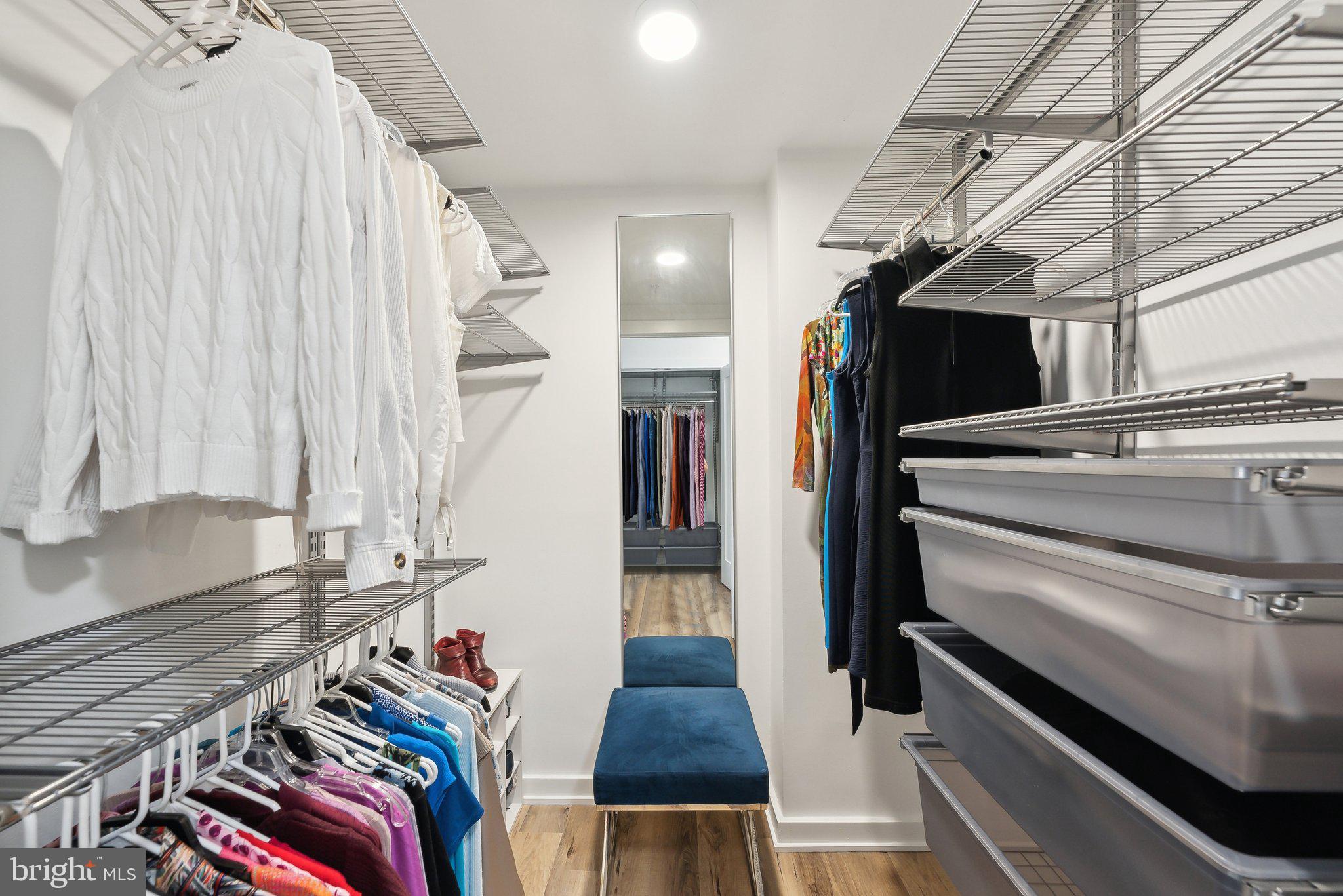 631 D Street Northwest, Unit 241 Washington, DC 20004 - Photo 23 of 81 a view of walk in closet with clothes and shoes