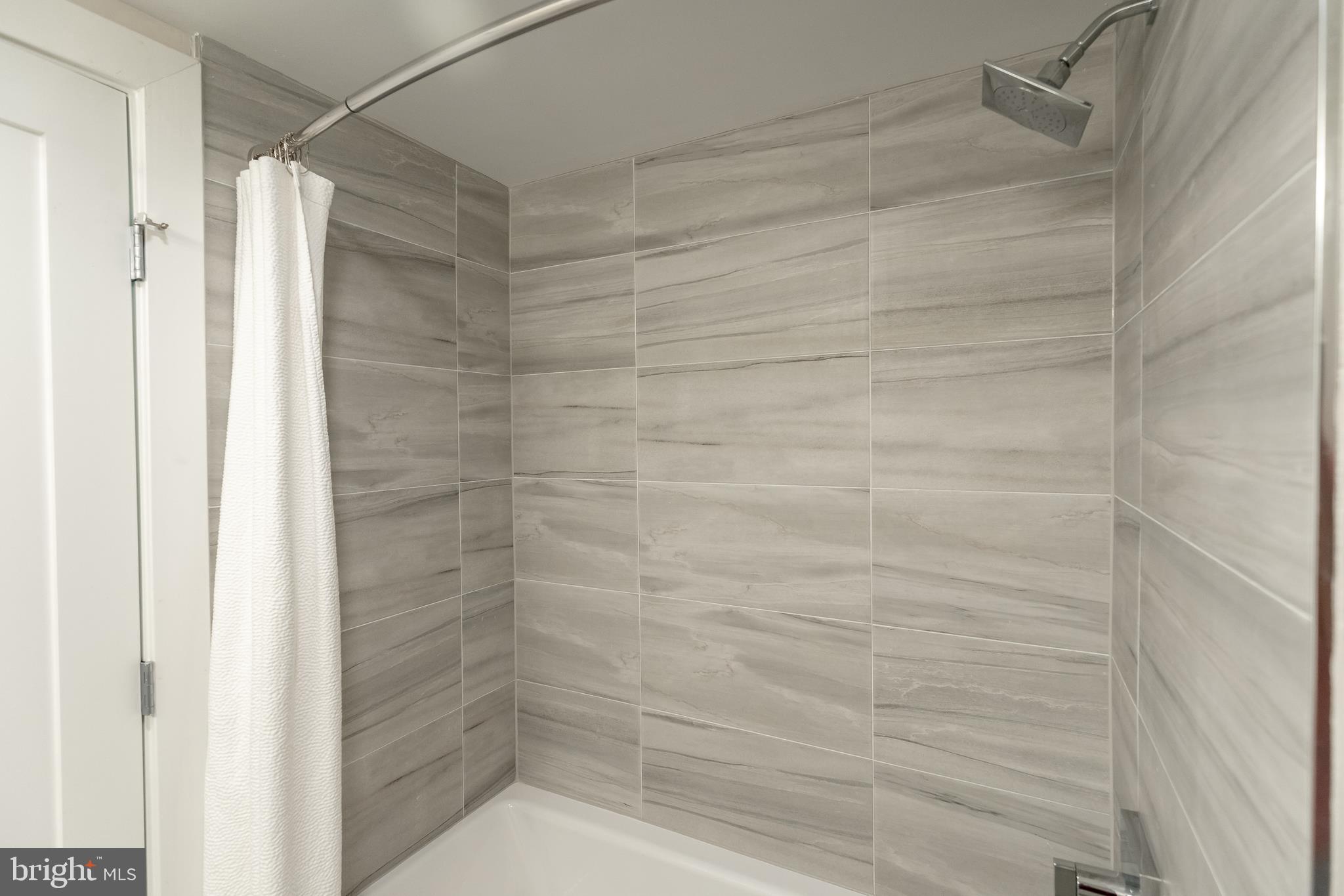 631 D Street Northwest, Unit 241 Washington, DC 20004 - Photo 30 of 81 a bathroom with a shower