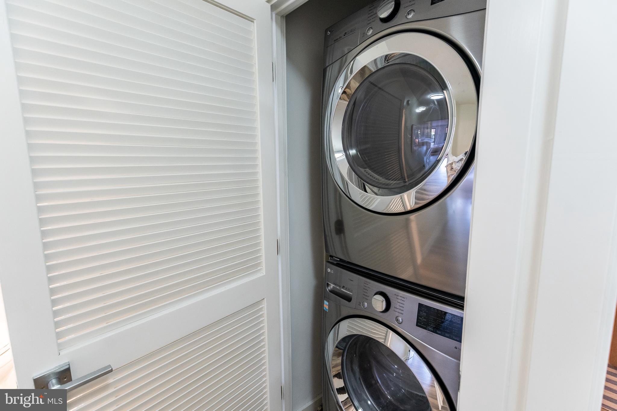 631 D Street Northwest, Unit 241 Washington, DC 20004 - Photo 31 of 81 a utility room with dryer and washer