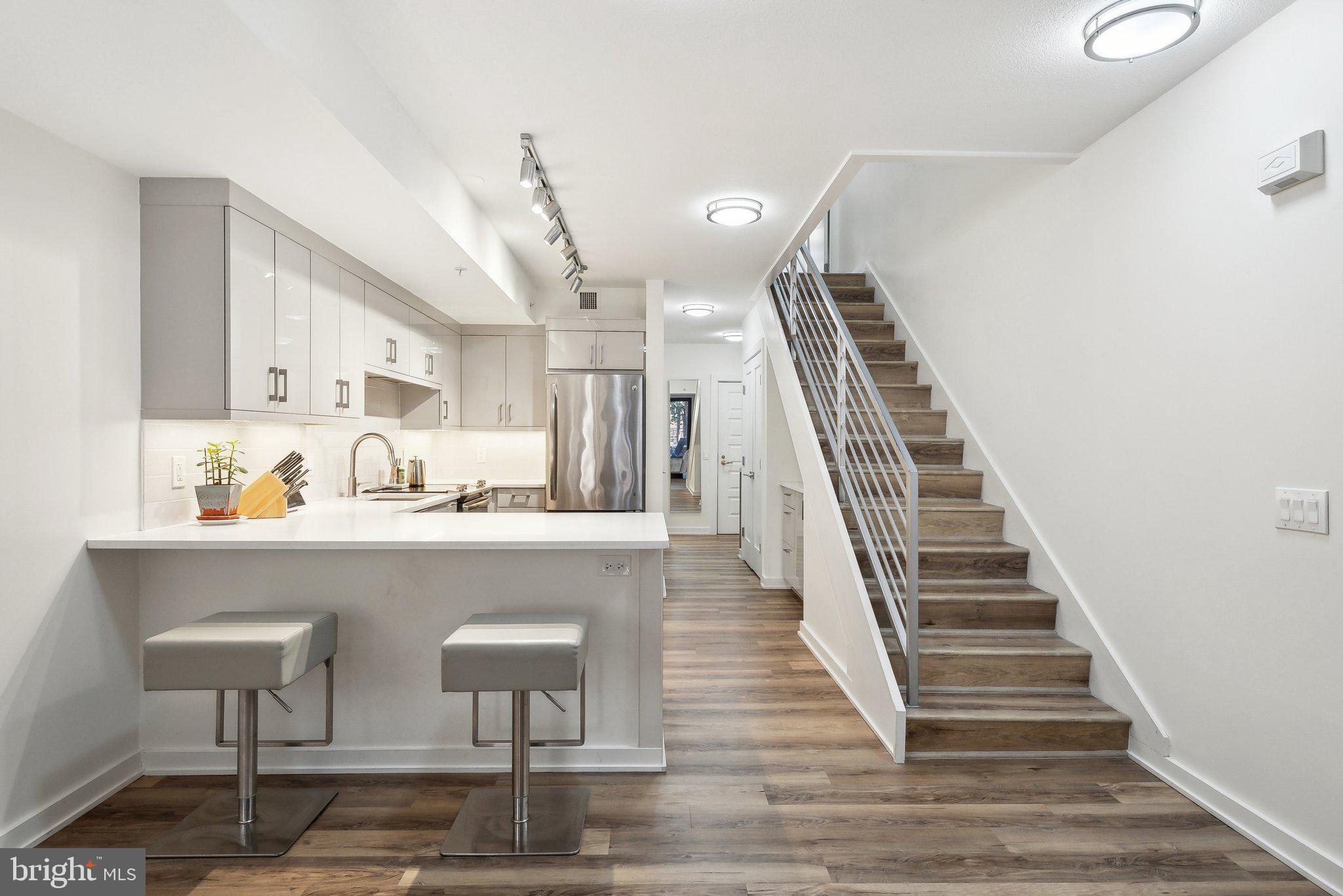 631 D Street Northwest, Unit 241 Washington, DC 20004 - Photo 4 of 81 Gleaming Surfaces & Soft-Close Cabinetry