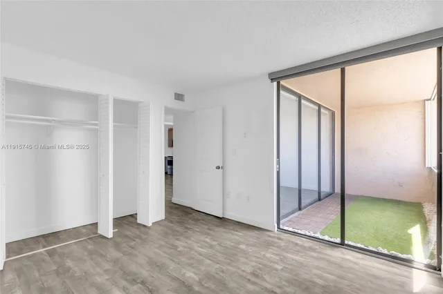 a view of an empty room with window