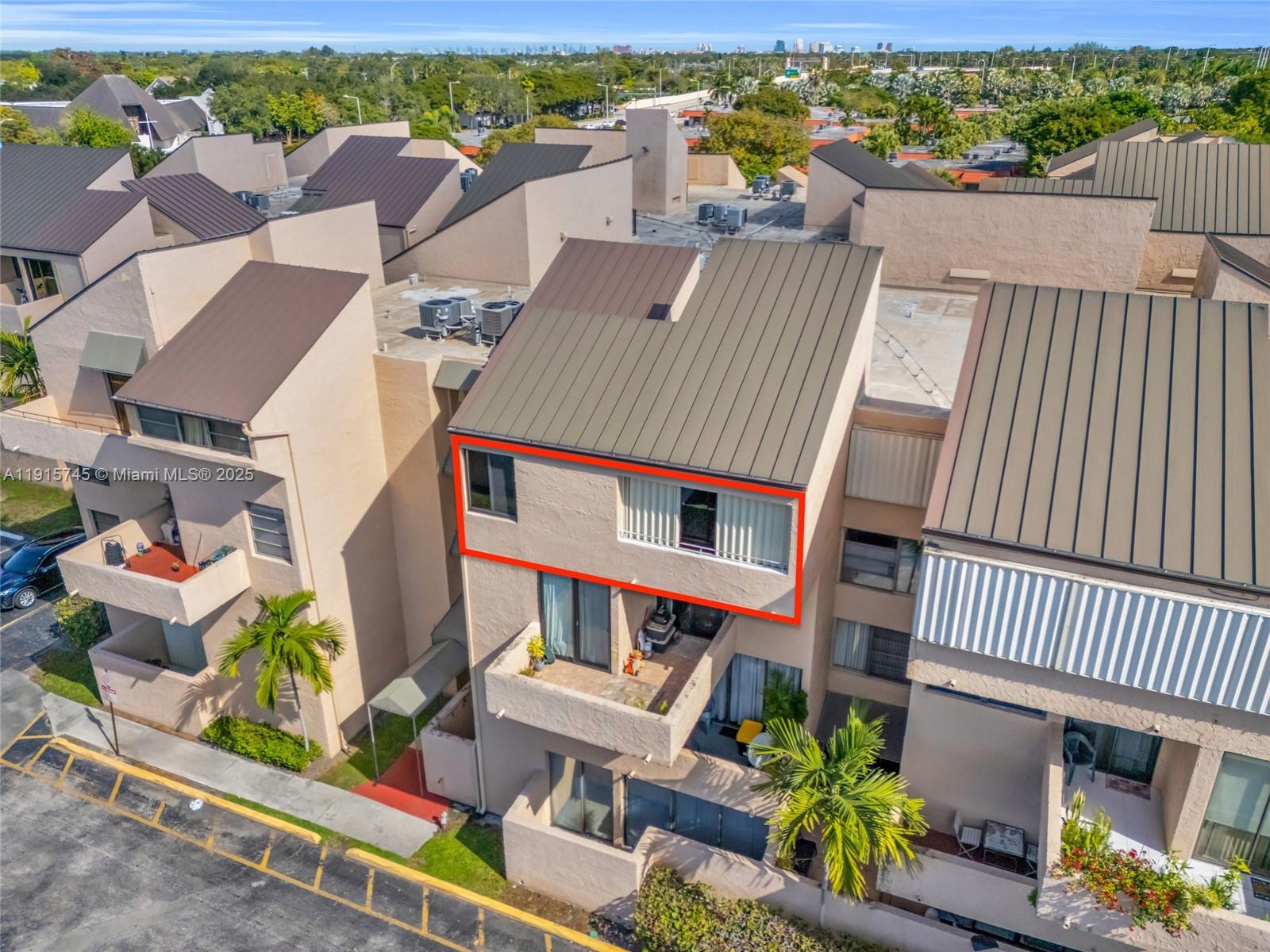 10400 Southwest 108th Avenue, Unit A413 Miami, FL 33176 - Photo 20 of 25 an aerial view of a house with a yard