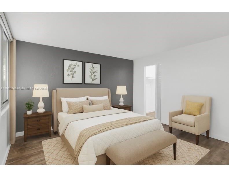 10400 Southwest 108th Avenue, Unit A413 Miami, FL 33176 - Photo 2 of 25 a bedroom with a bed and a couch