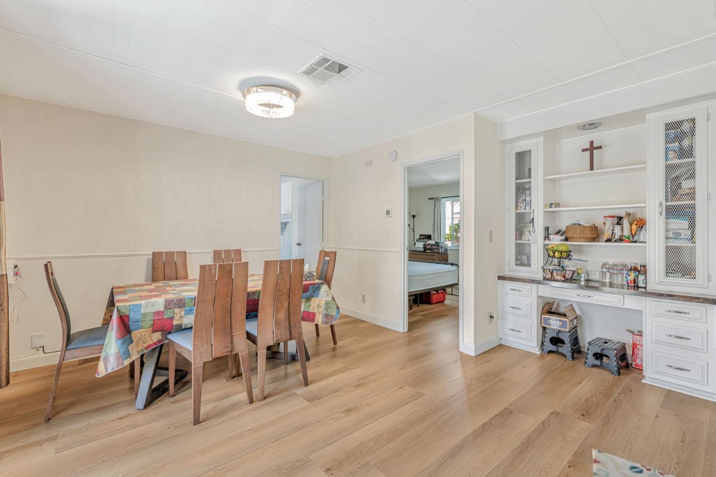 29129 Verdi Road, Unit 29129 Hayward, CA 94544 - Photo 12 of 37 a view of a workspace with furniture and wooden floor