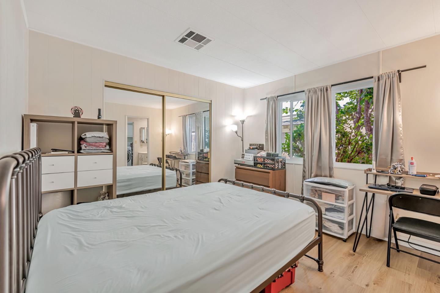 29129 Verdi Road, Unit 29129 Hayward, CA 94544 - Photo 14 of 37 a large bedroom with a bed and large windows