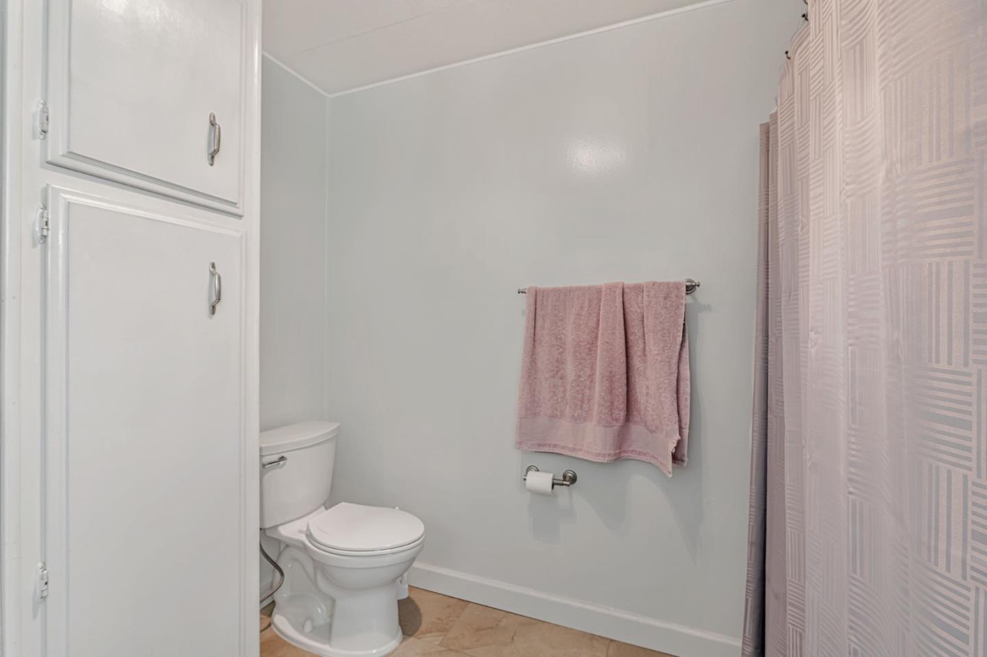 29129 Verdi Road, Unit 29129 Hayward, CA 94544 - Photo 23 of 37 a white toilet sitting next to a bathroom sink