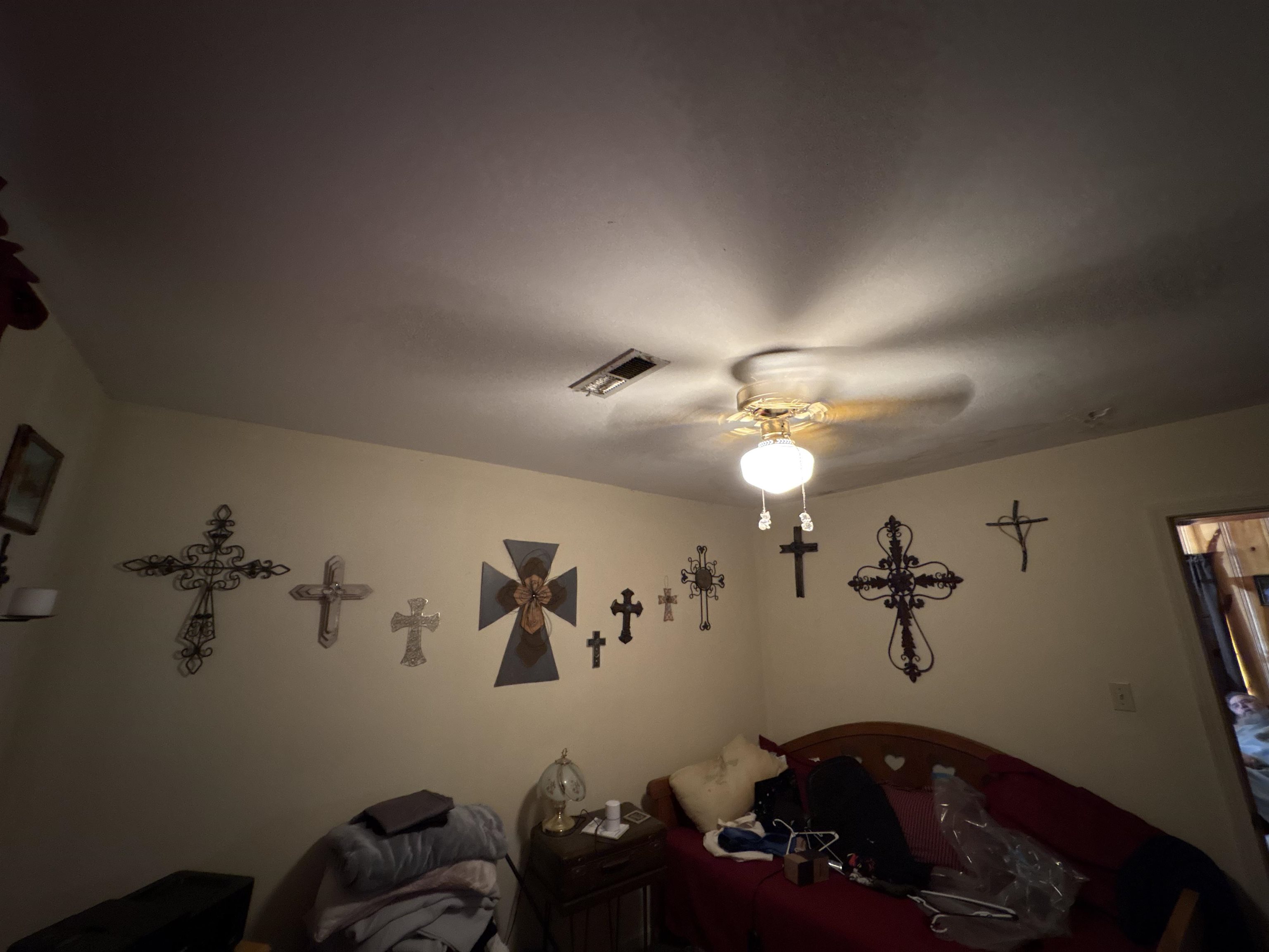 5091 Clinton Road Memphis, TN 38109 - Photo 29 of 34 a view of a chandelier fan and wooden floor