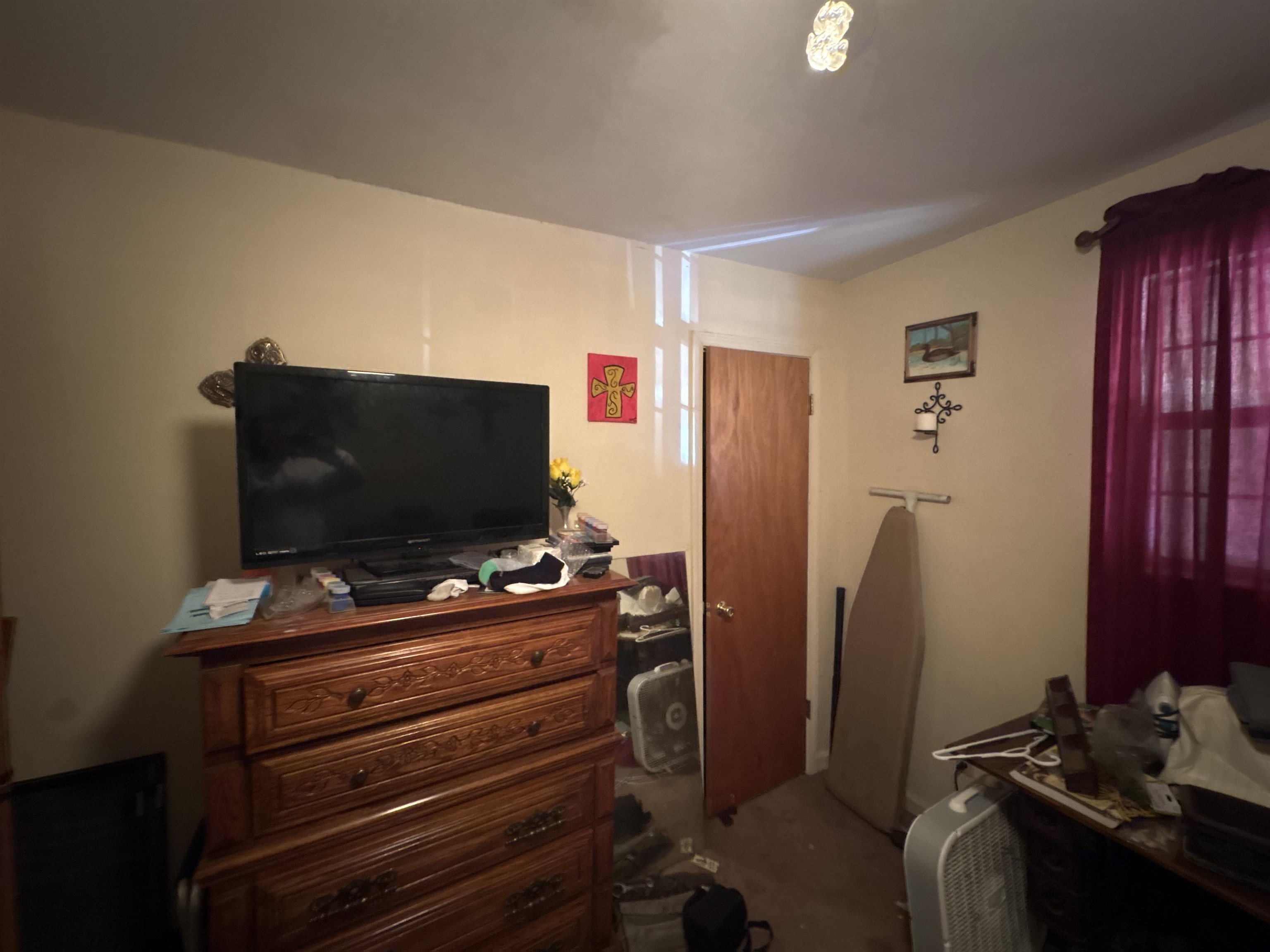 5091 Clinton Road Memphis, TN 38109 - Photo 30 of 34 a room with furniture and flat screen tv
