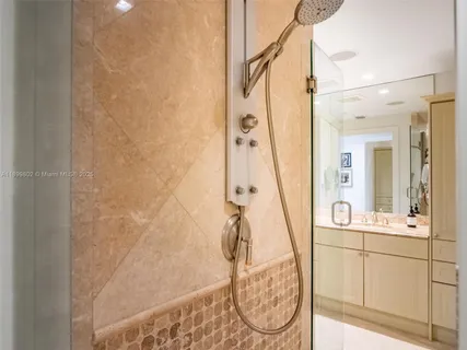 a bathroom with a sink and mirror