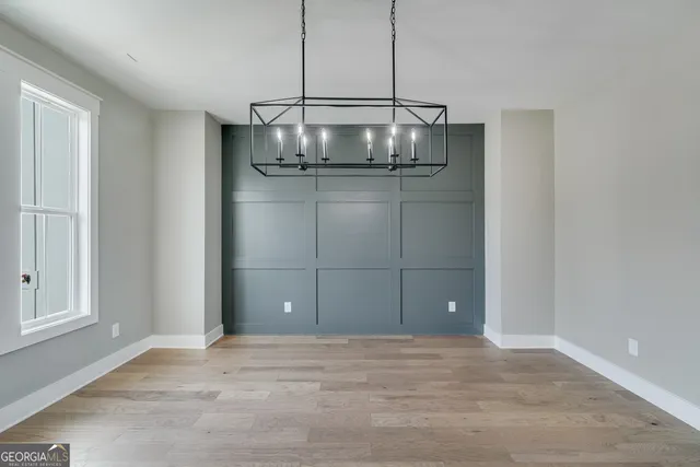 a view of a room with a trees