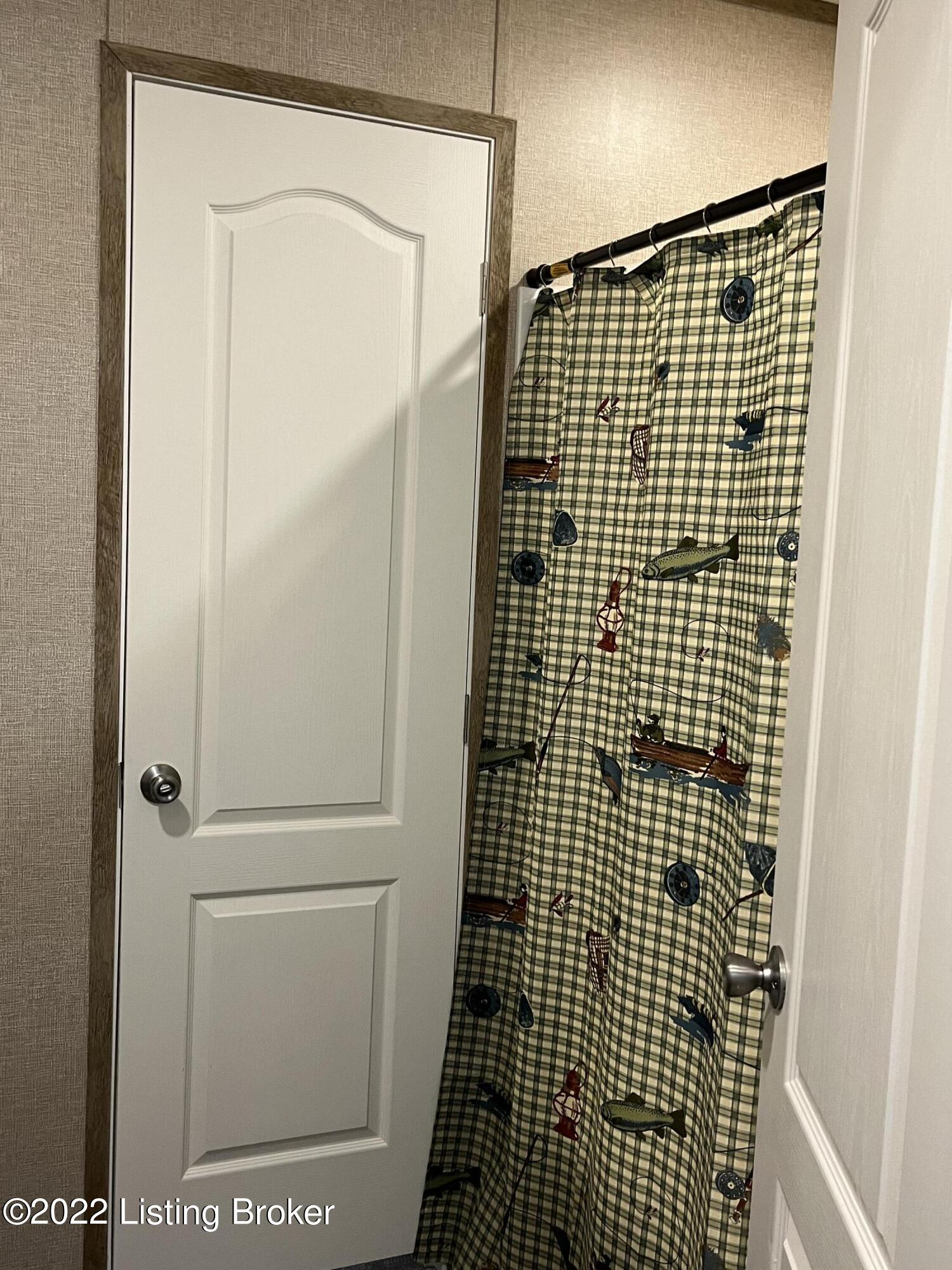 960 Nolin Park Road Clarkson, KY 42726 - Photo 16 of 24 SHOWER IN HALF BATH WITH DOOR TO LAUNDRY RM