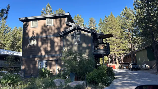 a view of a building with a yard