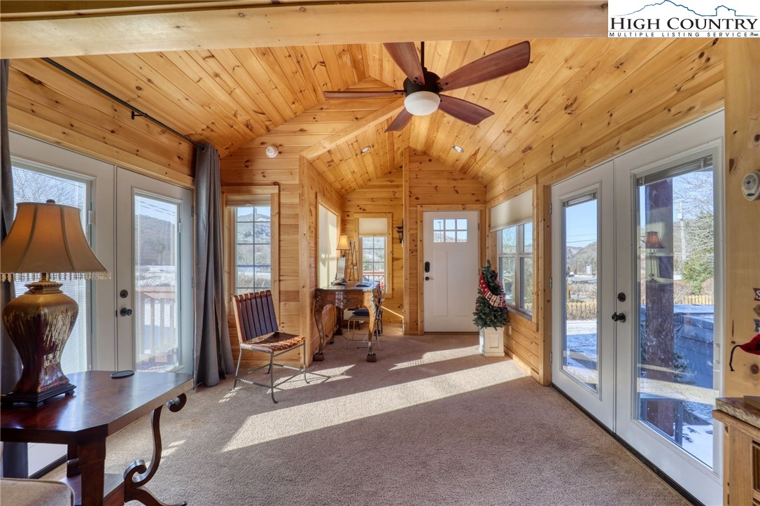 72 Arnett Road Banner Elk, NC 28604 - Photo 14 of 38 a view of a livingroom with furniture and windows