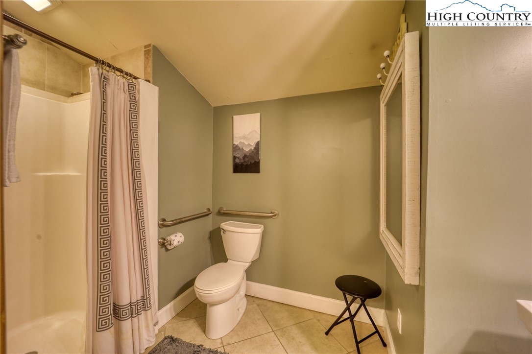 72 Arnett Road Banner Elk, NC 28604 - Photo 20 of 38 a bathroom with a toilet and a shower