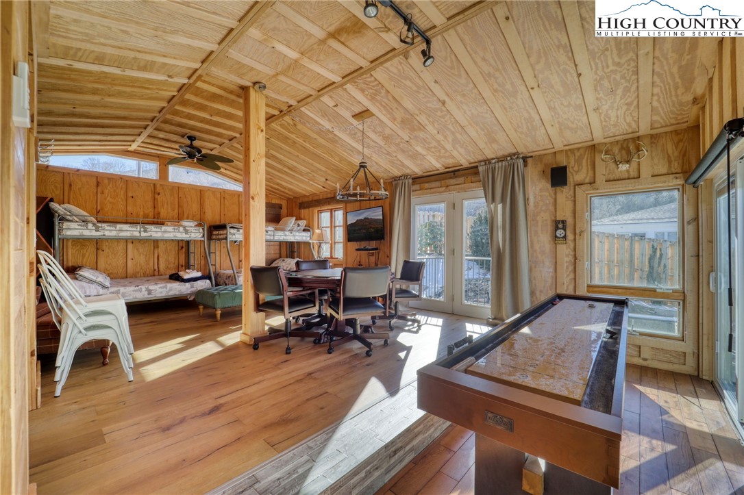 72 Arnett Road Banner Elk, NC 28604 - Photo 28 of 38 a living room with furniture a couch and wooden floor
