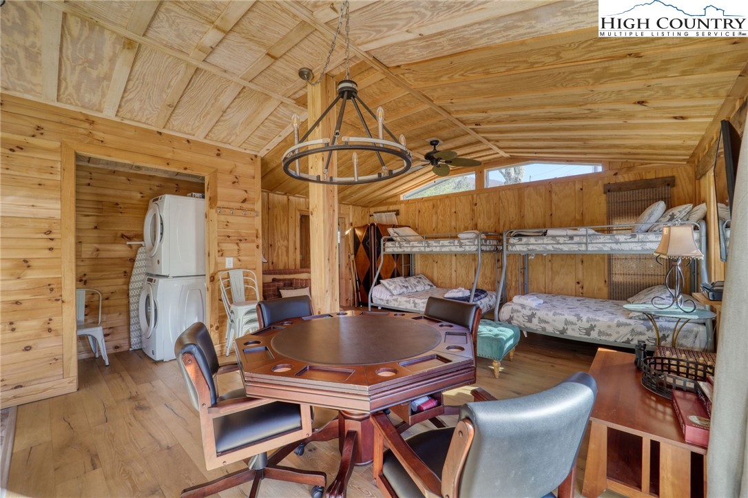 72 Arnett Road Banner Elk, NC 28604 - Photo 30 of 38 a backyard of a house with barbeque oven table and chairs