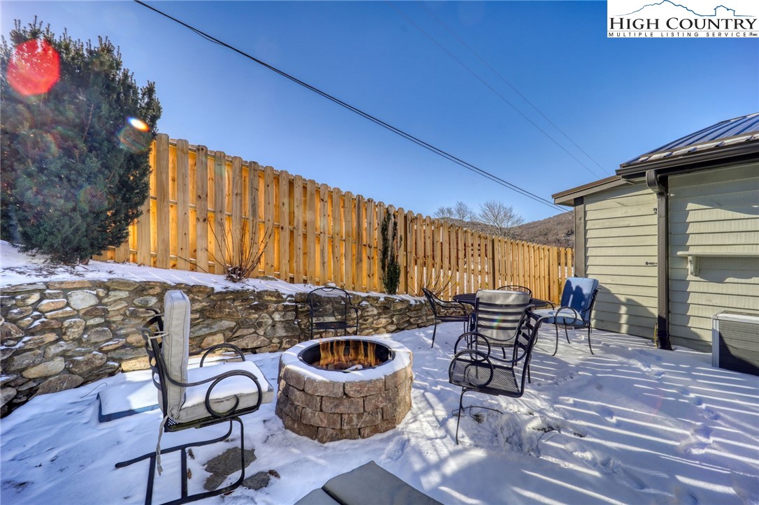 72 Arnett Road Banner Elk, NC 28604 - Photo 35 of 38 a outdoor space with patio the couches and a potted plant