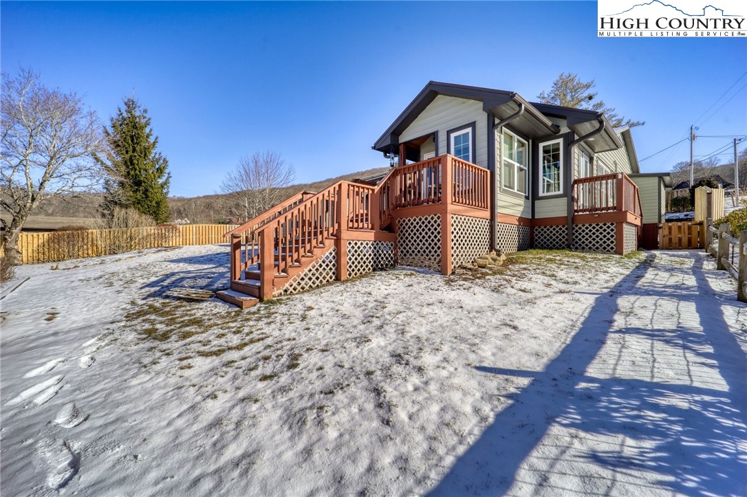 72 Arnett Road Banner Elk, NC 28604 - Photo 38 of 38 a view of a house with a yard