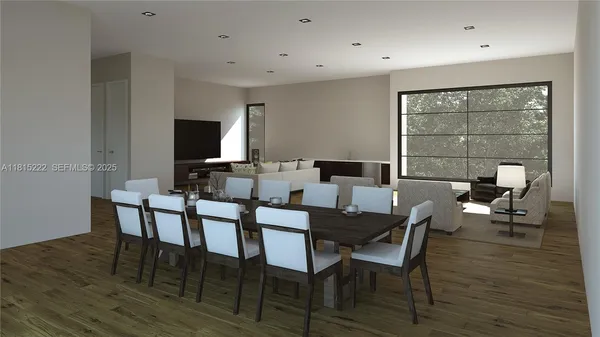 a dining room with furniture and wooden floor