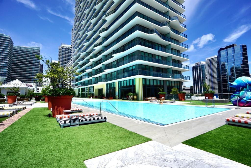 1300 South Miami Avenue, Unit 2005 Miami, FL 33130 - Photo 43 of 46 a front view of a building with garden