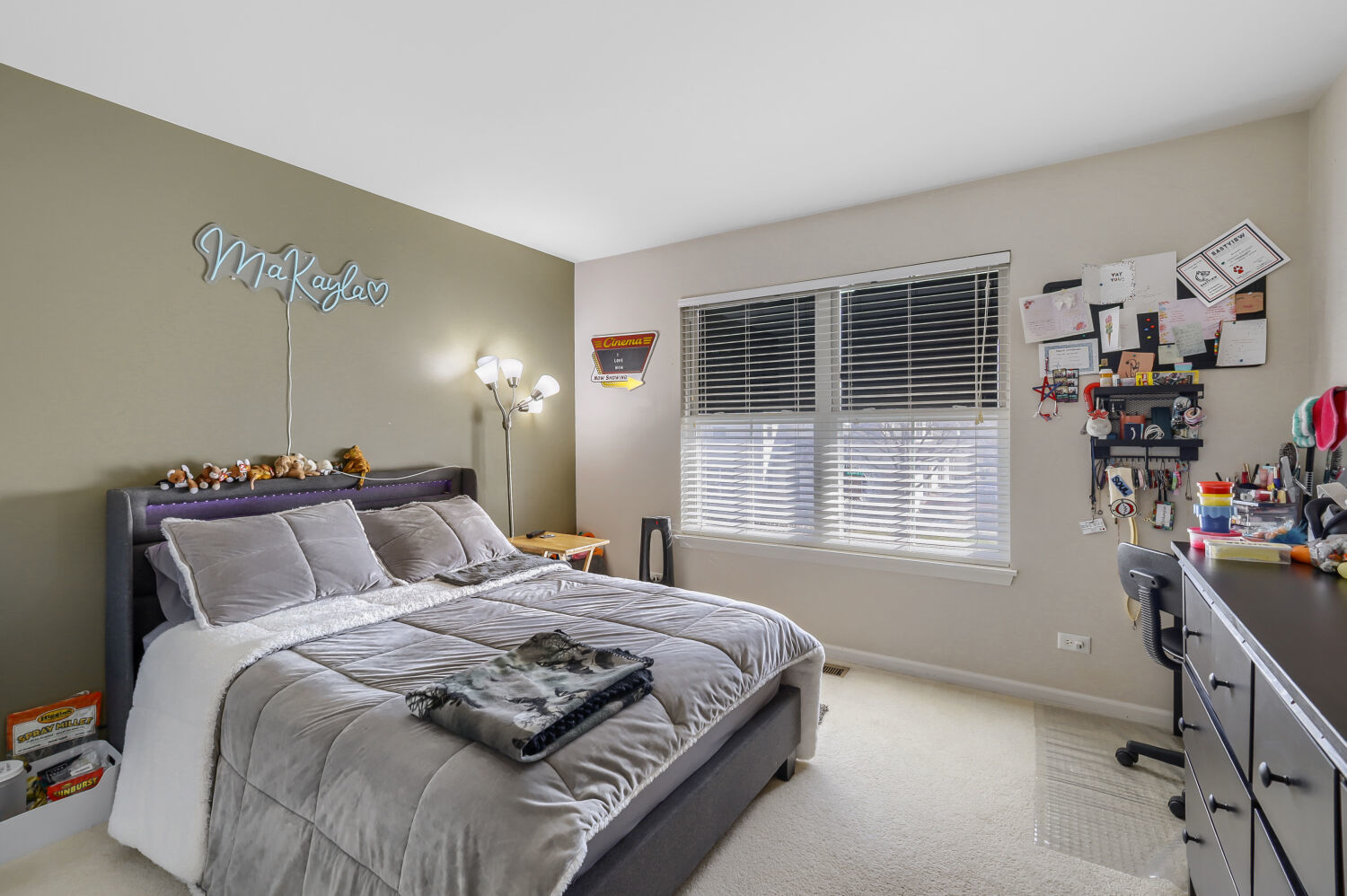 422 Victoria Lane Elgin, IL 60124 - Photo 13 of 22 a bed sitting in a bedroom next to a window
