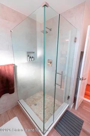 a white toilet sitting next to a bathroom sink