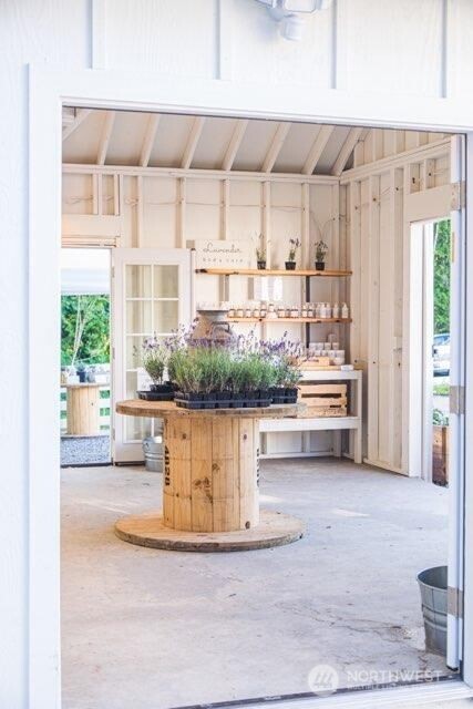 20129 Tveit Road Arlington, WA 98223 - Photo 24 of 31 a view living room with stainless steel appliances kitchen island granite countertop furniture and a window