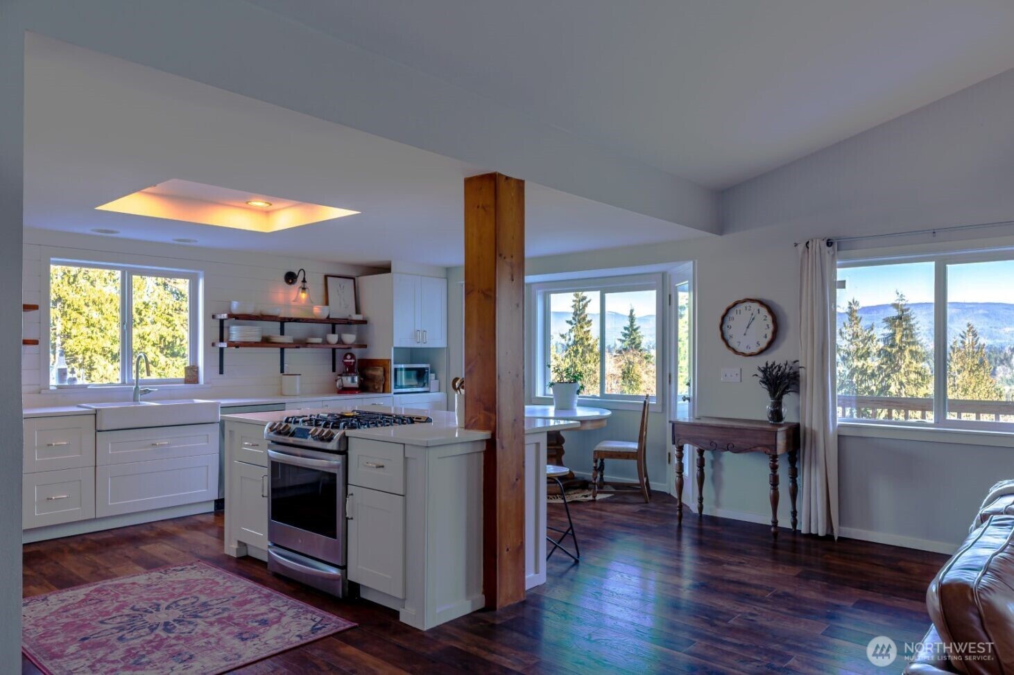 20129 Tveit Road Arlington, WA 98223 - Photo 4 of 31 a open kitchen with stainless steel appliances granite countertop a stove and a refrigerator