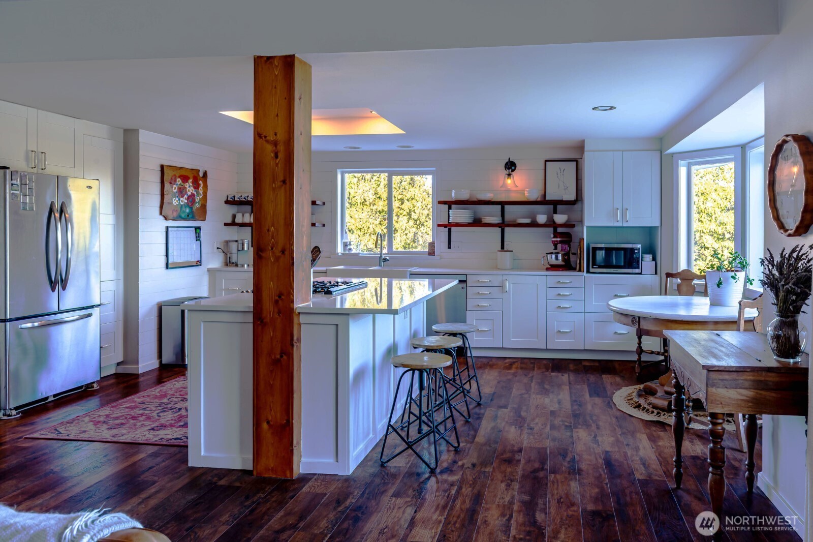 20129 Tveit Road Arlington, WA 98223 - Photo 5 of 31 a living room with furniture and a wooden floor