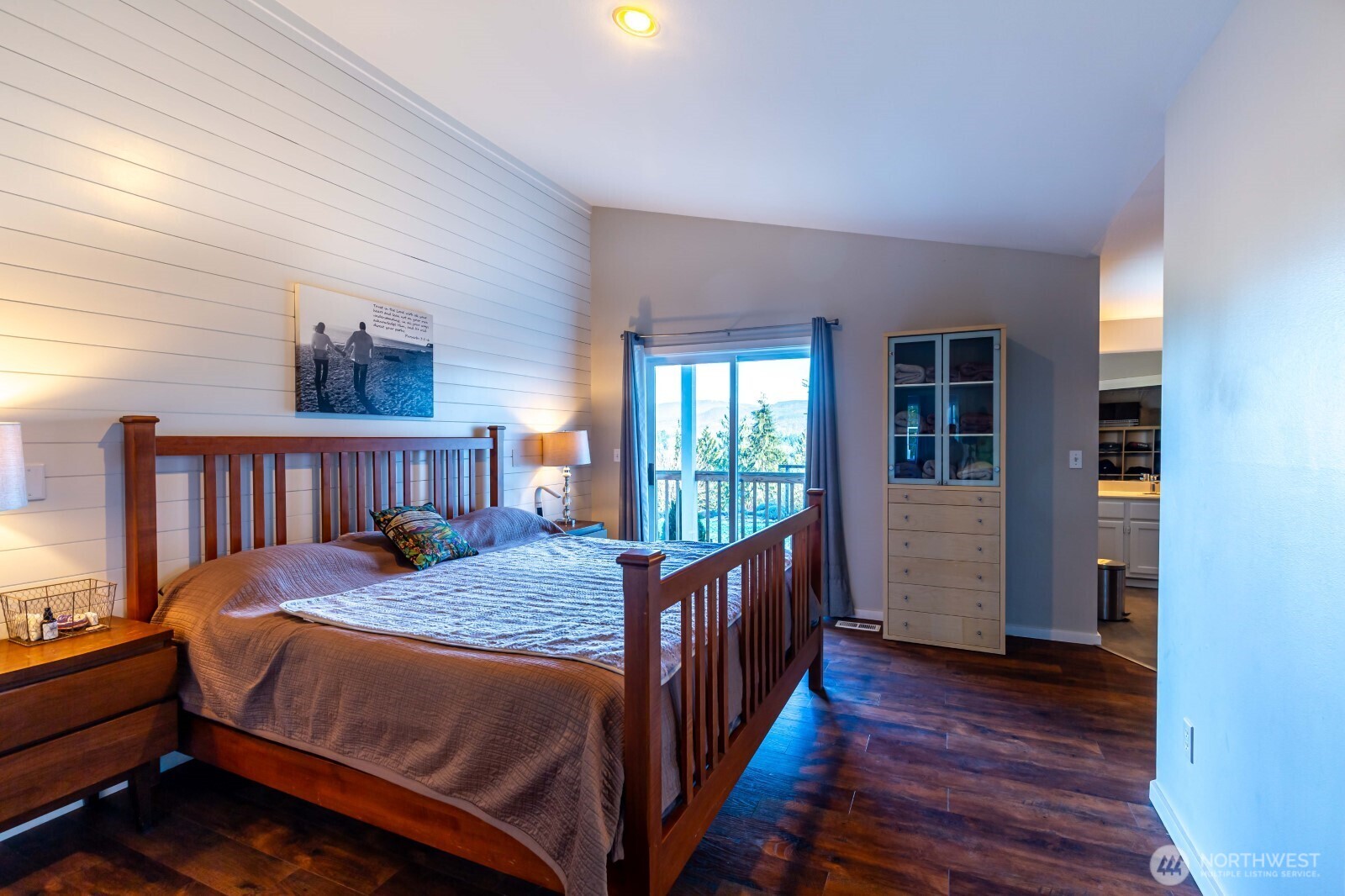 20129 Tveit Road Arlington, WA 98223 - Photo 9 of 31 a bed sitting in a bedroom next to a window