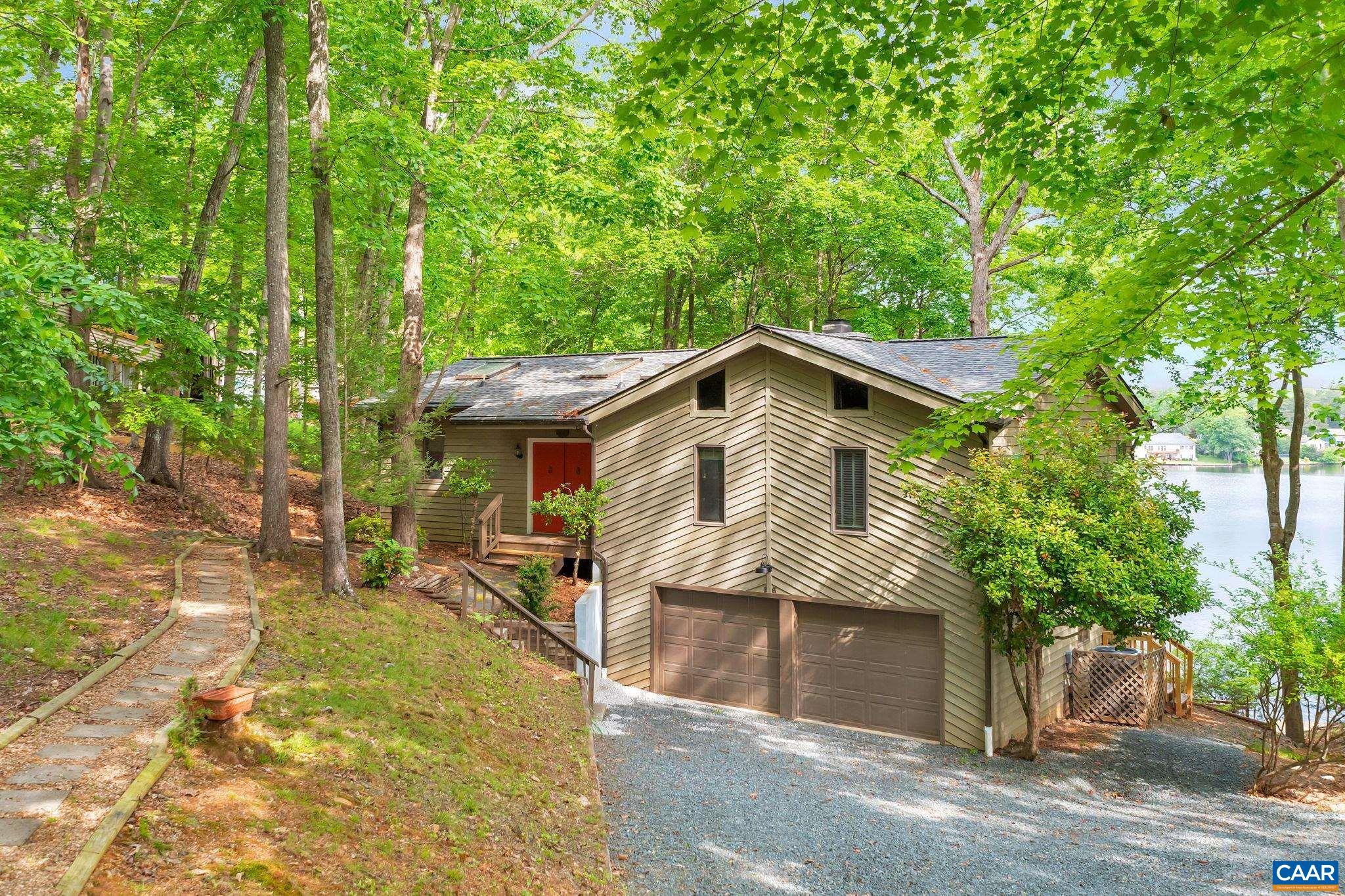 16 Bonita Road Palmyra, VA 22963 - Photo 1 of 39 a front view of a house with a yard