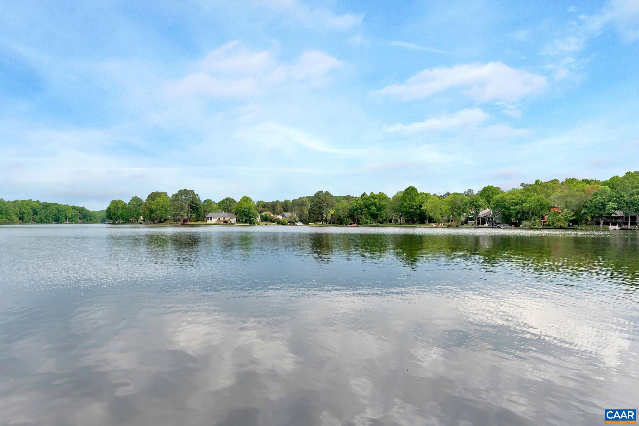 16 Bonita Road Palmyra, VA 22963 - Photo 3 of 39 a view of a lake with houses in the background