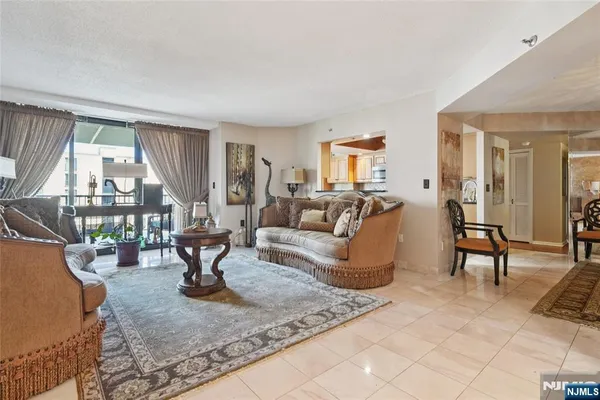 a living room with furniture and a table