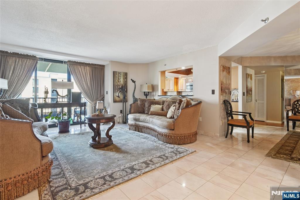 a living room with furniture and a table