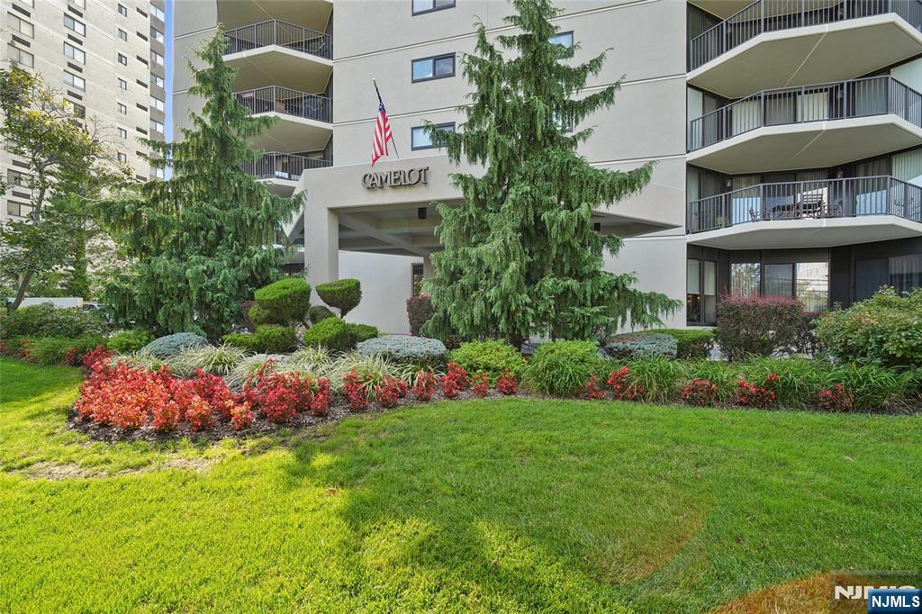 245 Prospect Avenue, Unit 5B Hackensack, NJ 07601 - Photo 25 of 35 a view of a house with a yard and potted plants