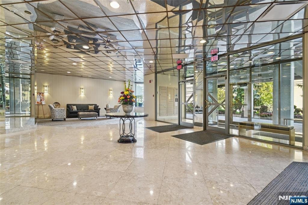 245 Prospect Avenue, Unit 5B Hackensack, NJ 07601 - Photo 29 of 35 a view of a room with gym equipment