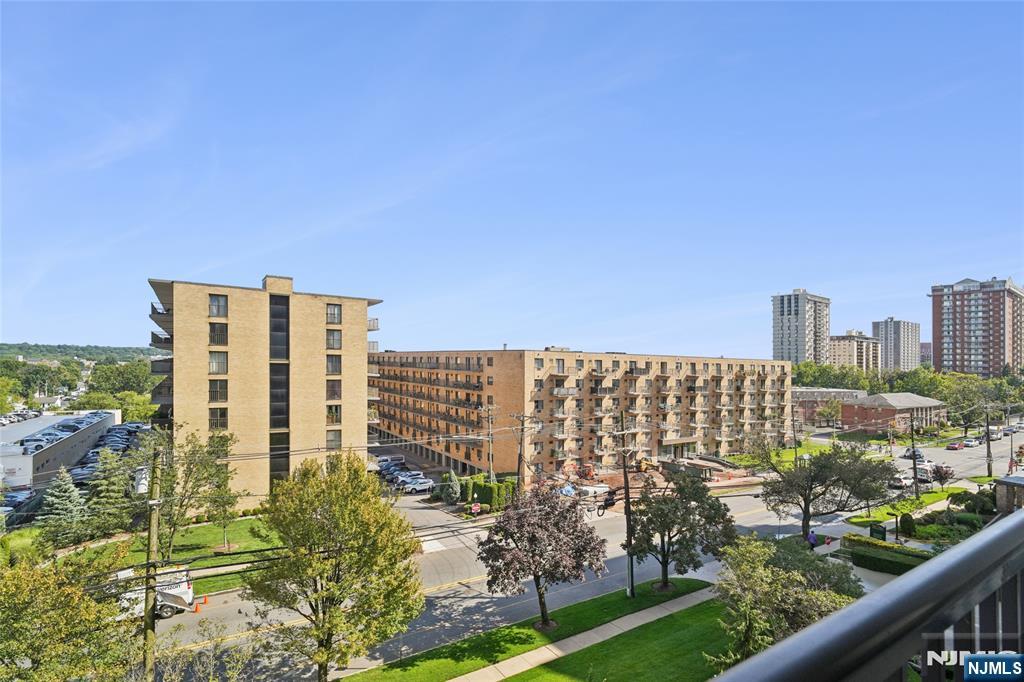 245 Prospect Avenue, Unit 5B Hackensack, NJ 07601 - Photo 30 of 35 a view of a city with tall buildings