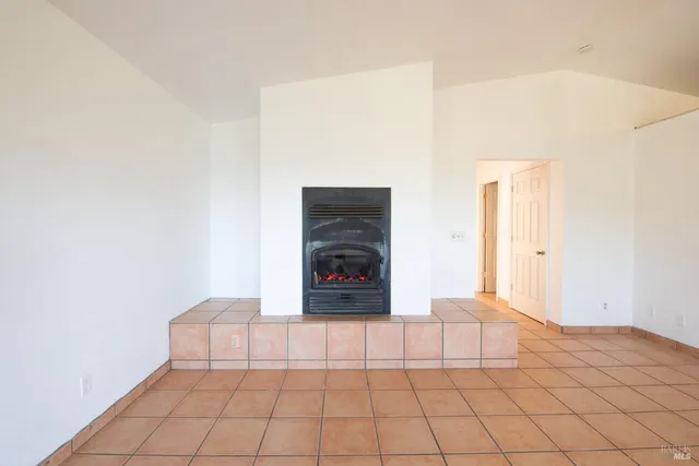 a view of a livingroom with a fireplace