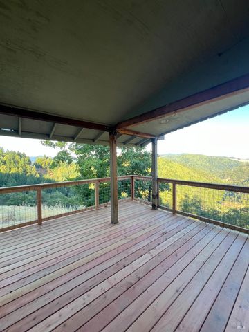 a view of porch with wooden floor