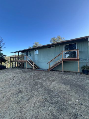 a view of balcony with wooden floor