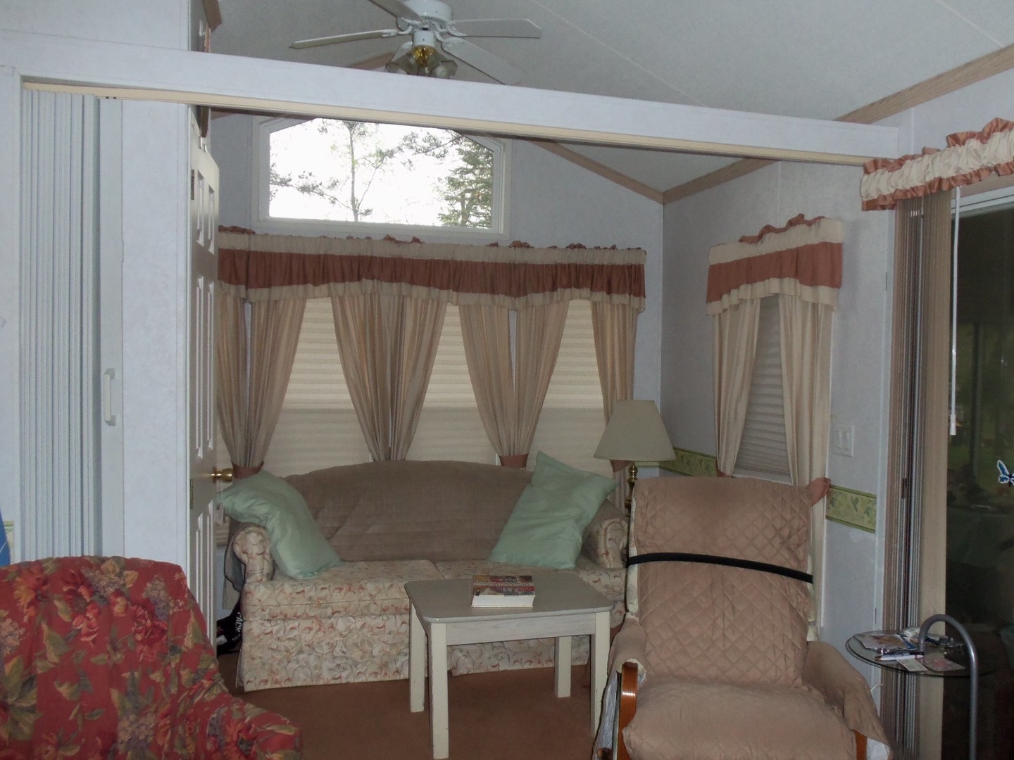 7-150 Woodhaven Sublette, IL 61367 - Photo 9 of 16 a living room with furniture and a window