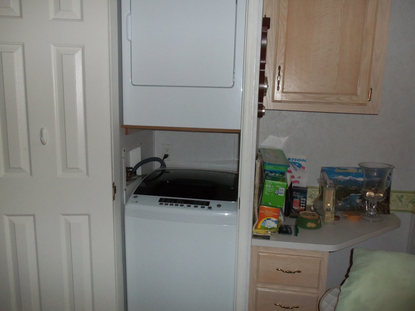 7-150 Woodhaven Sublette, IL 61367 - Photo 10 of 16 a kitchen with a refrigerator and a stove top oven