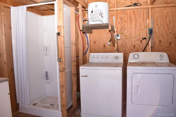 a utility room with dryer and washer