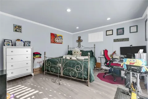 a view of a chairs and table in the back yard of the house