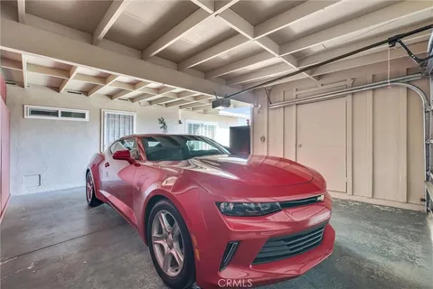a view of a house with a street