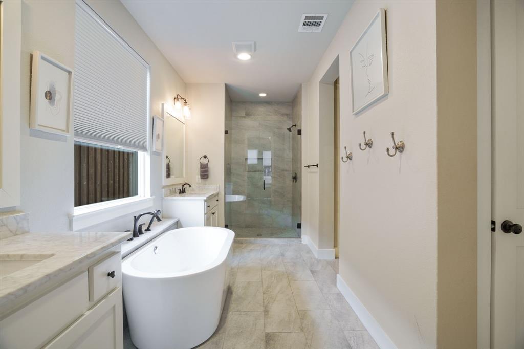 313 East 3rd Street Prosper, TX 75078 - Photo 17 of 38 a bathroom with a sink and a mirror